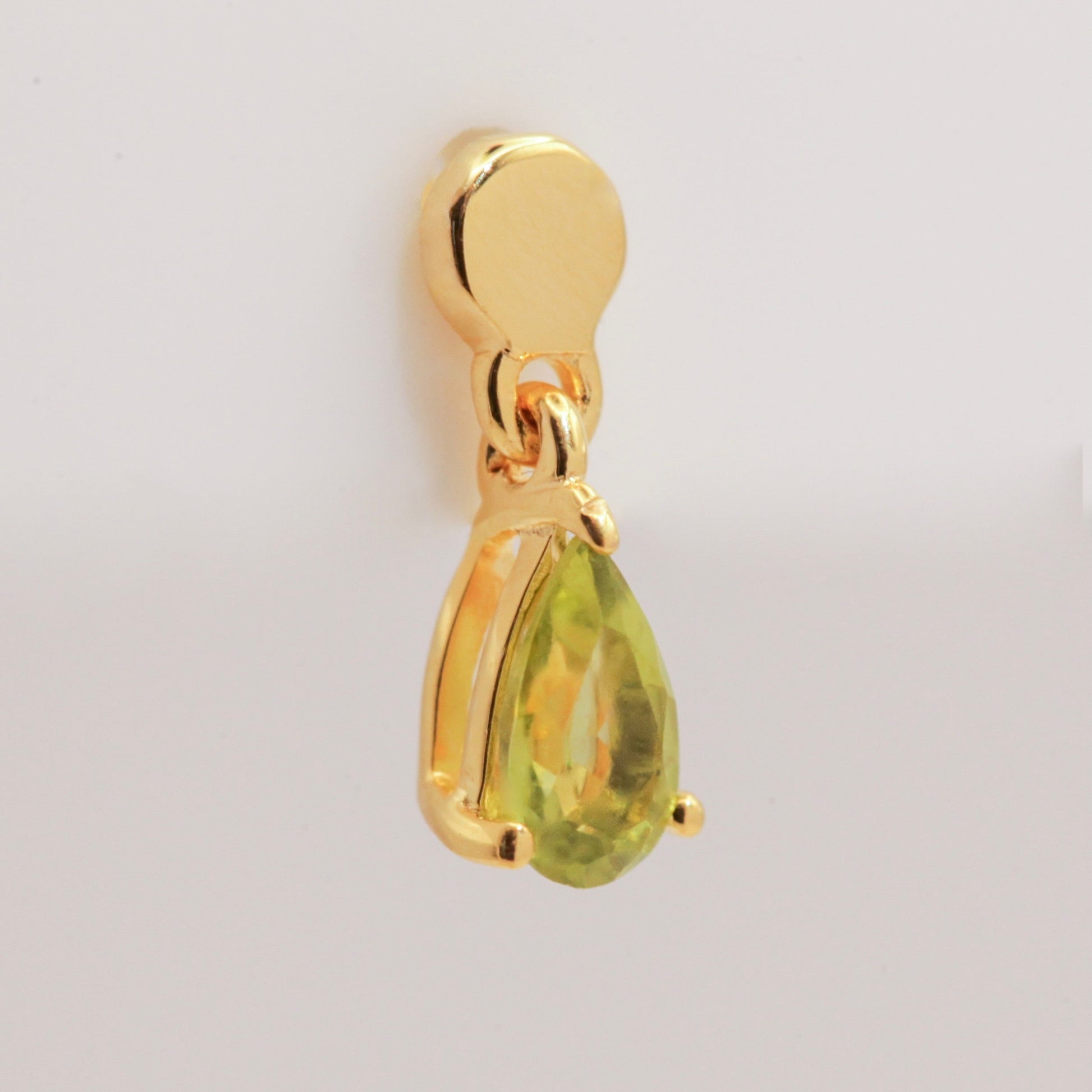 Peridot gold earring
