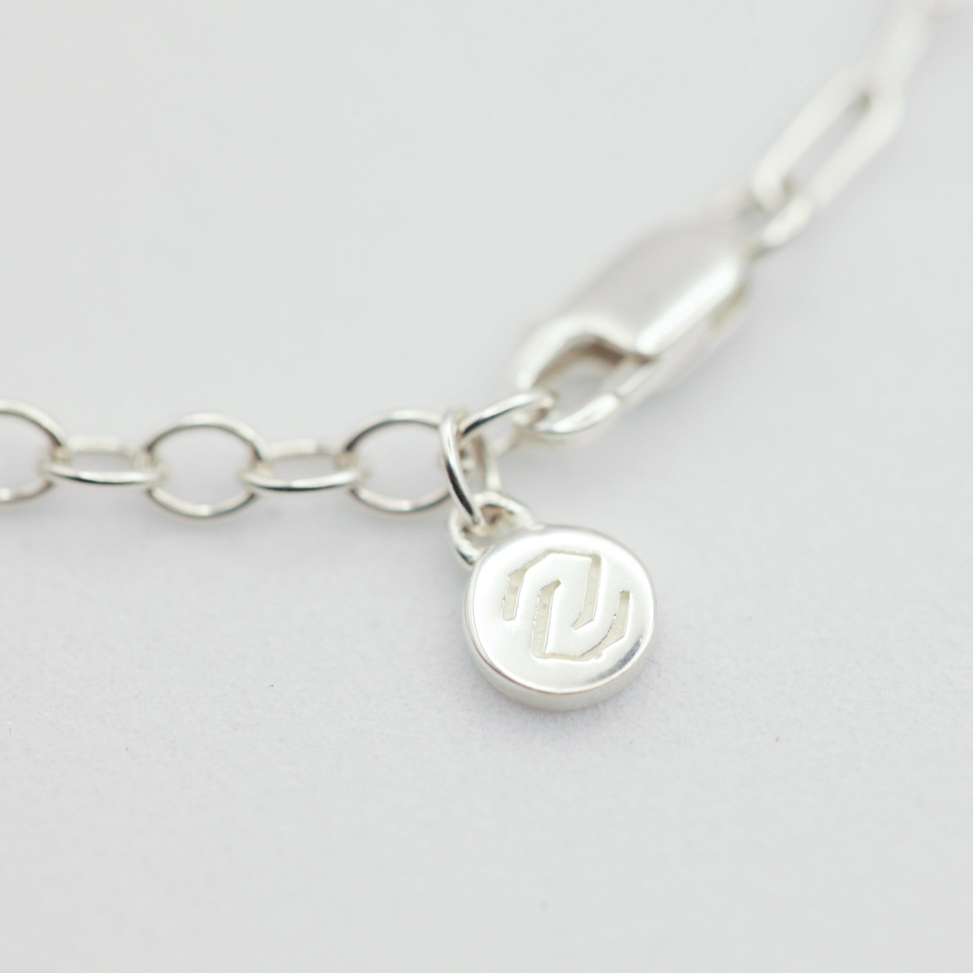 Zilu necklace tag in silver